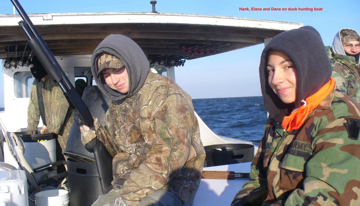 08HankElanaDanaOnBoat.JPG